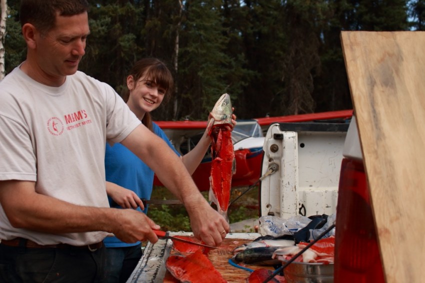 Last Tuesday at 9pm, James said, "Fishing looks good in Chitina." By 10:30p, he was on the road for the 6.5-hr drive to the Copper River. He went out on the morning's charter, got dropped off on a rock with his huge net and newest fishing buddy, and by 3:00p, they had pulled in 110 sockeye salmon, 85 bound for our freezer. Thankful for the Lord's abundant provision and the cheerful, able help put in by the whole family to put up this year's harvest.
