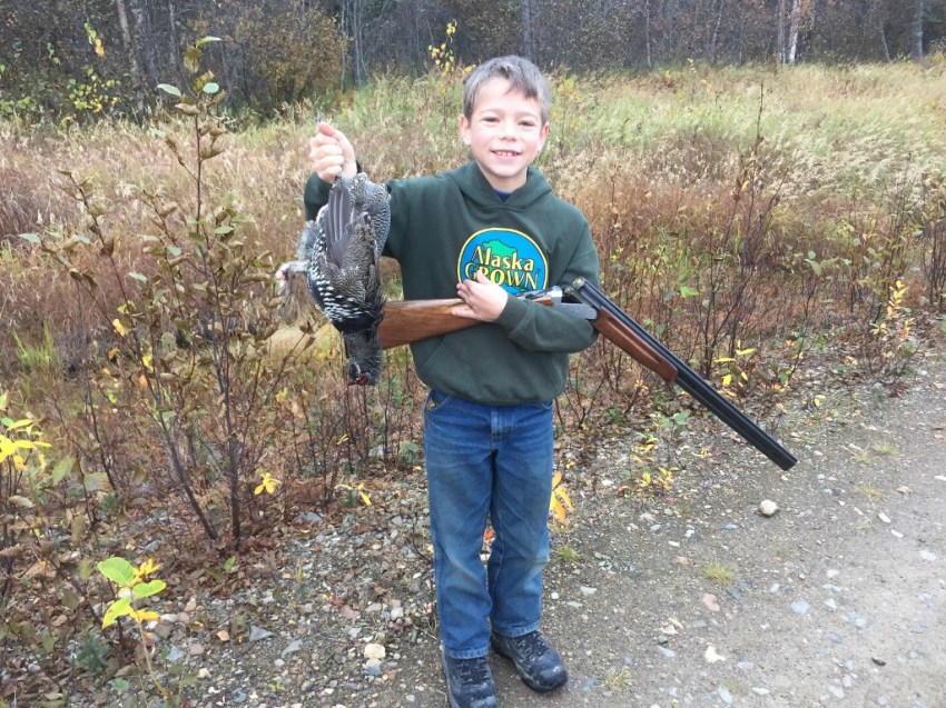 Jared's first bird: grouse taken on the wing in Grayling