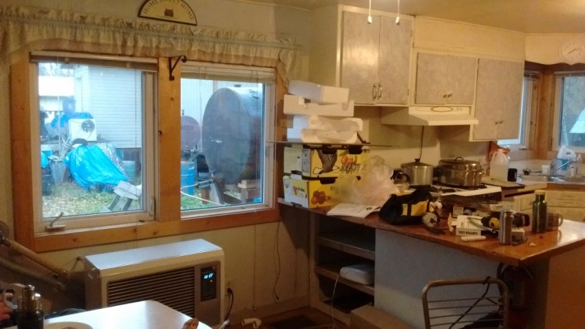 The Toyo stove is postitioned centrally in the house, in the dining room area in the kitchen. (Fuel tank is seen just outside the window.)