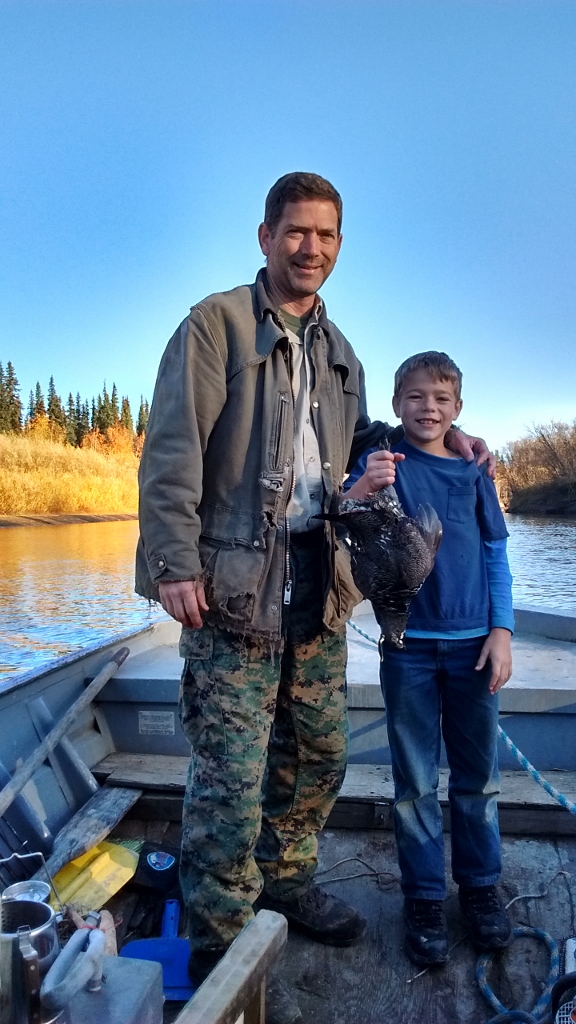 Jared's #2 grouse, taken with a .22 shot from the bow of the boat