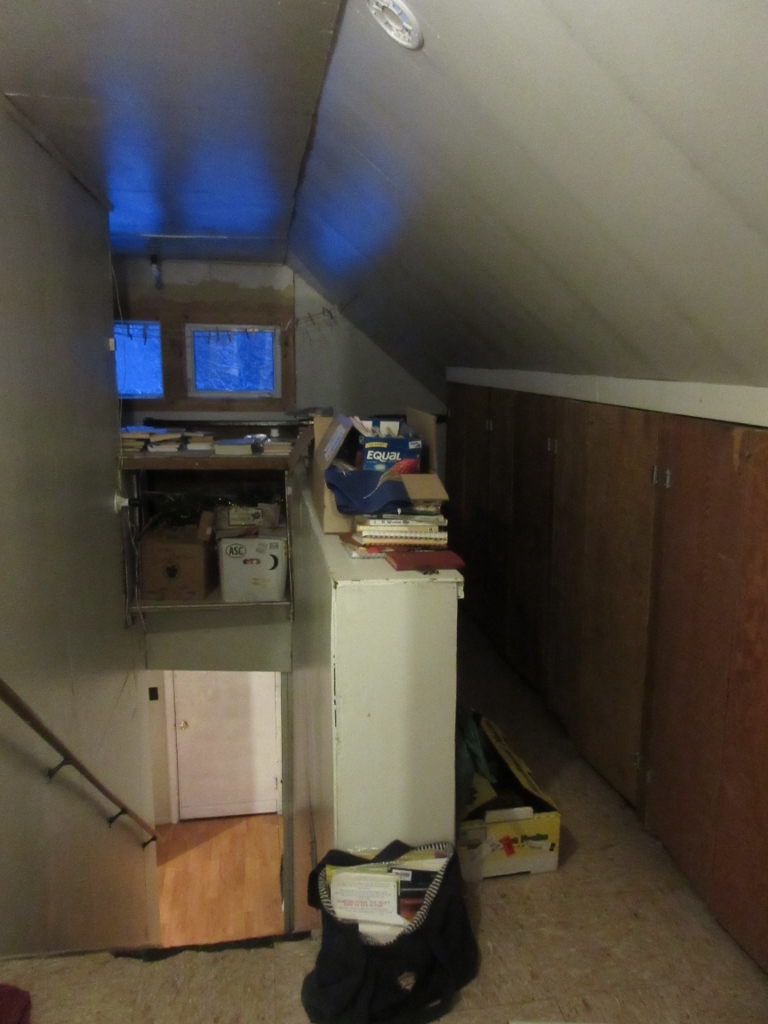 Upstairs storage area...next pictures show views from the two windows, glowing with sunrise reflecting off of snow.